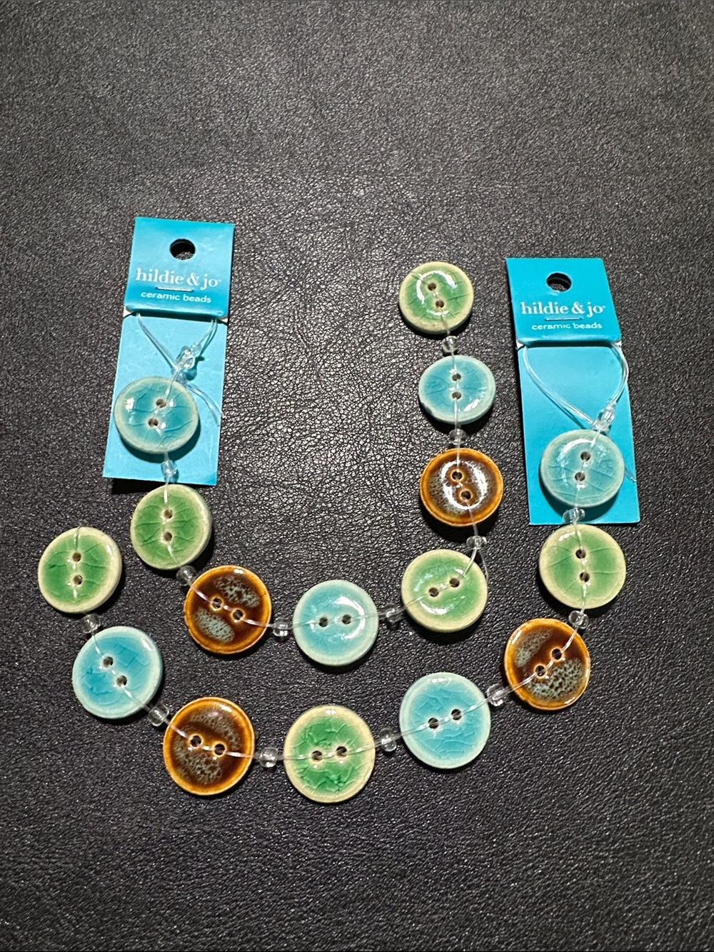 12.  Hildie & Jo 2 Strands Ceramic Button Beads